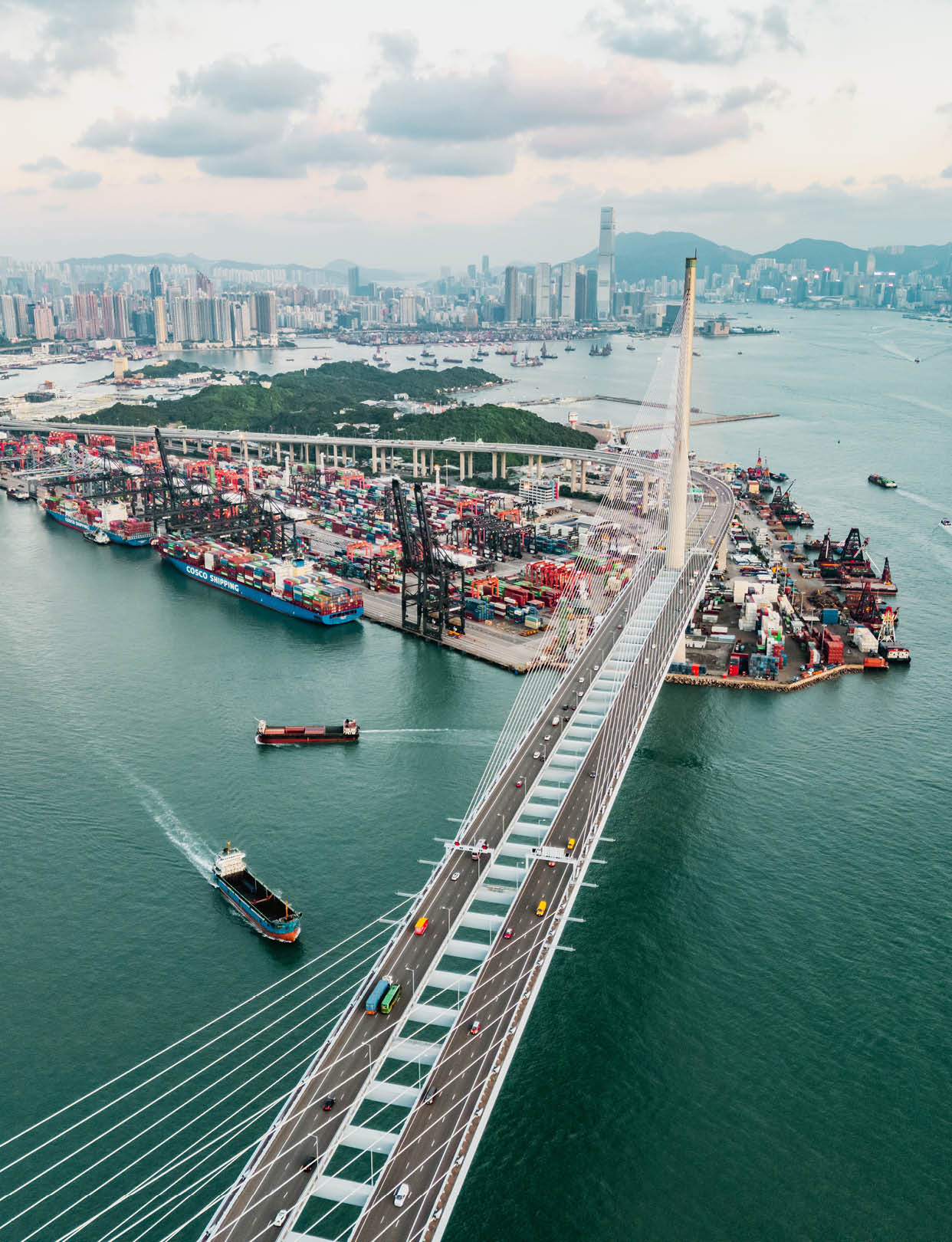 Drone view of Stonecutters Bridge and the Tsing sha highway at sunset