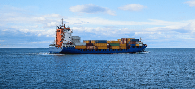 Large cargo ship sailing on the sea